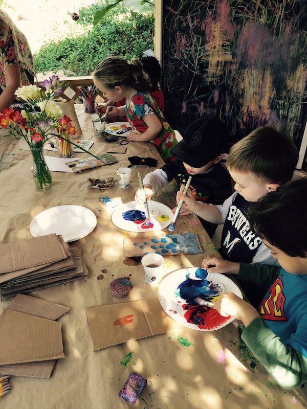 CMP Kids painting in art class