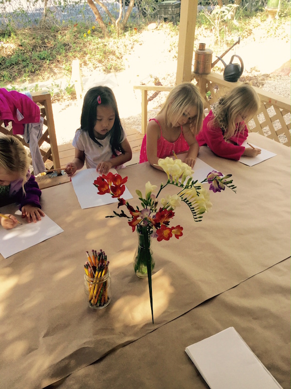Kids drawing spring flowers
