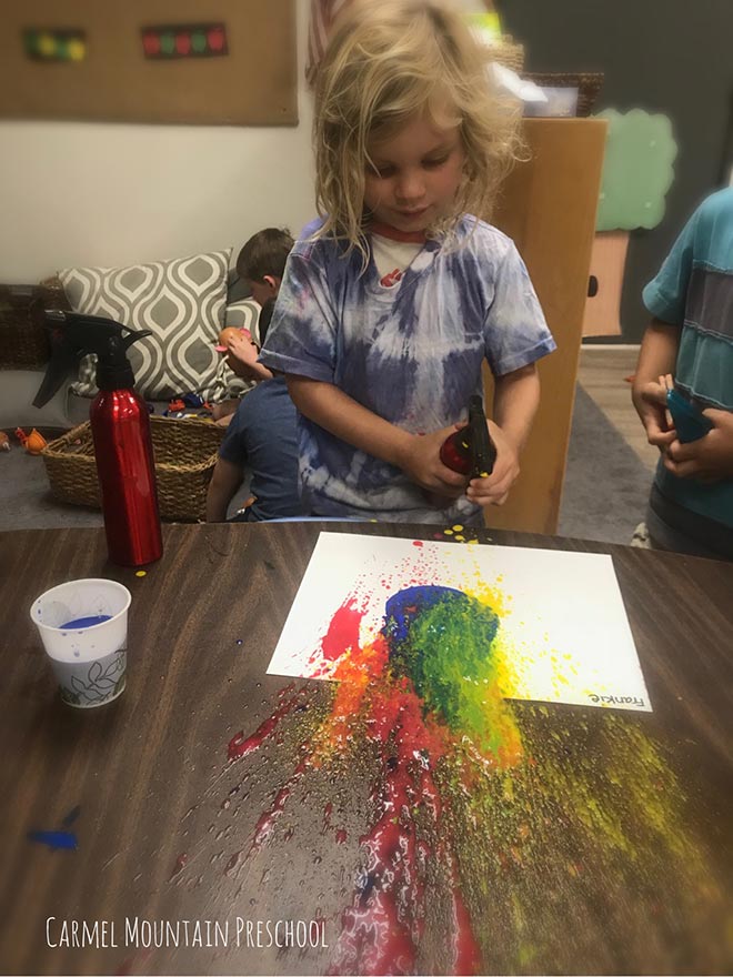 Making spray bottle art in our daycare center