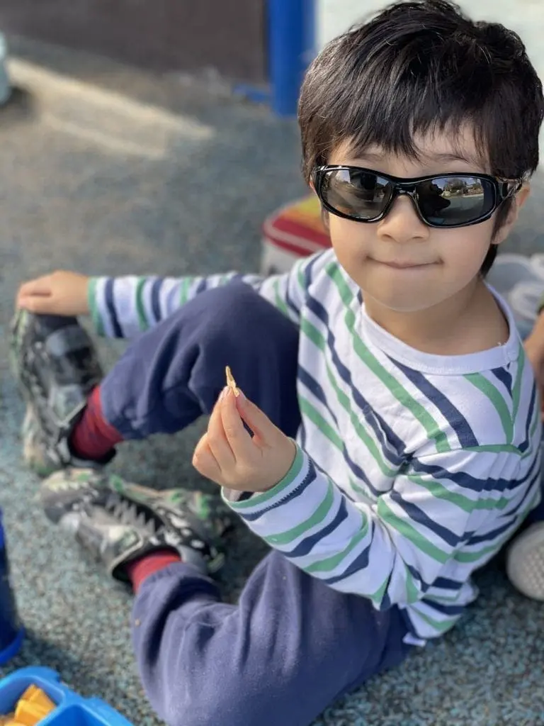 three year old with sunglasses on