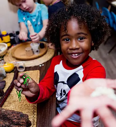 toddler learns about insects and rocks