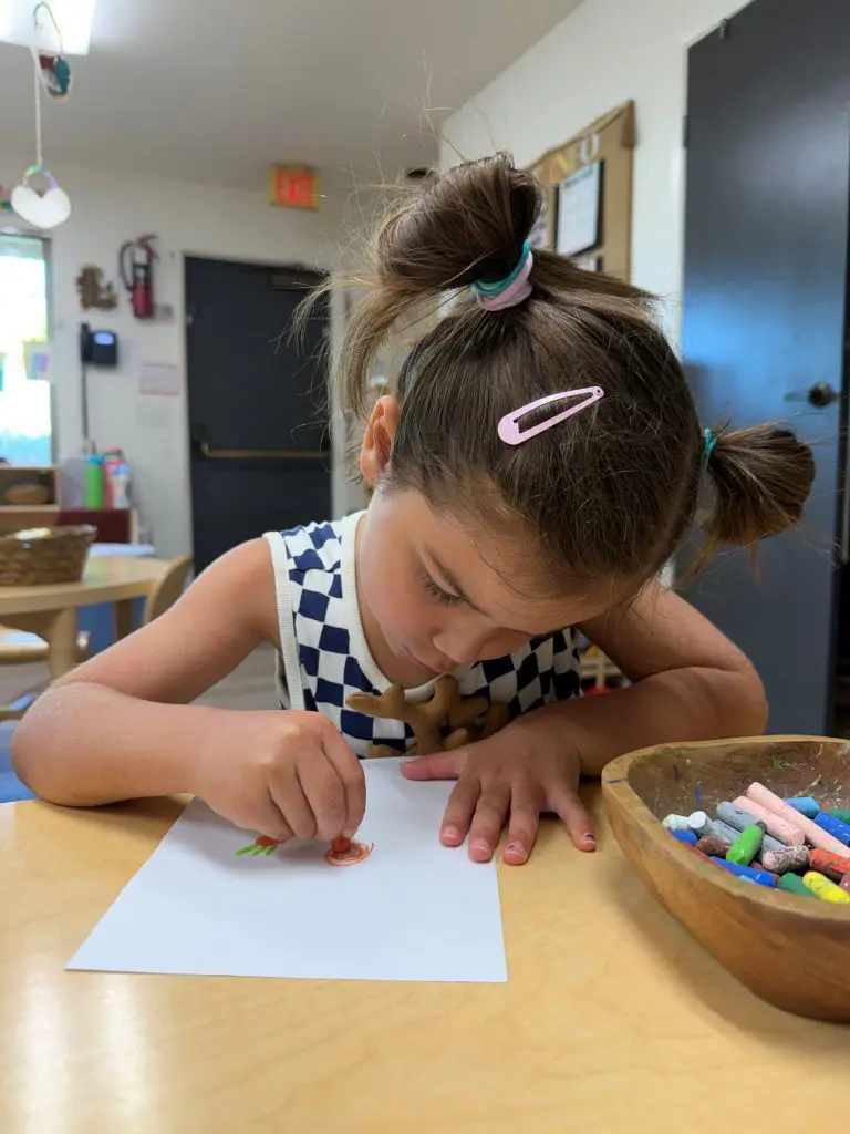 young girl learning Fine motor activities