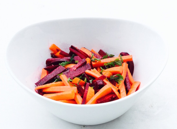Carrot and beet salad with fresh mint is a fun, fall inspired recipe.