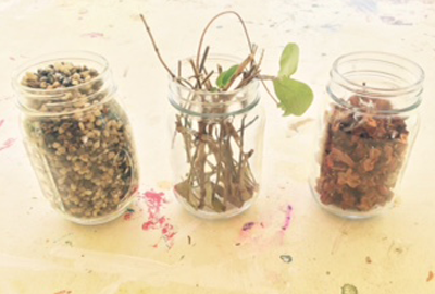 art project materials in jar 