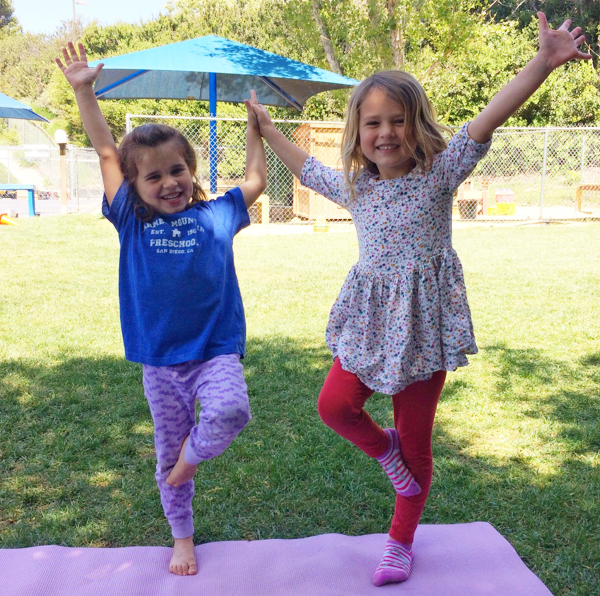 Children doing yoga at Carmel Mountain Preschool