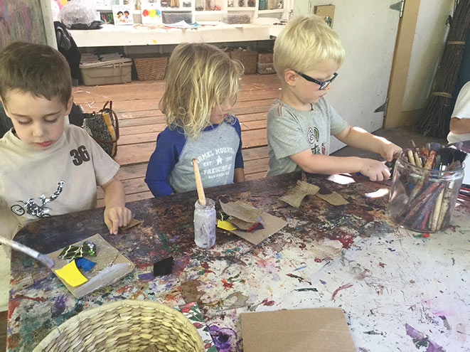 toddlers creating the friendship quilt