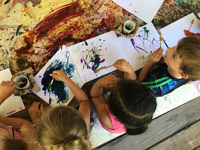 children painting at our daycare center