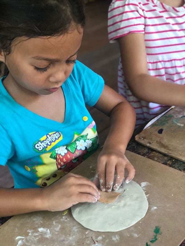 kids working in our art studio at our daycare