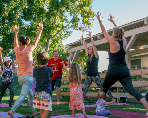 yoga together as family at child care center