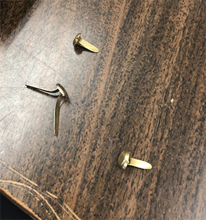 Brass Pins on a table