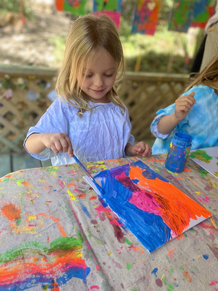 young girl painting