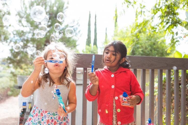children-blowing-bubbles-at-preschool