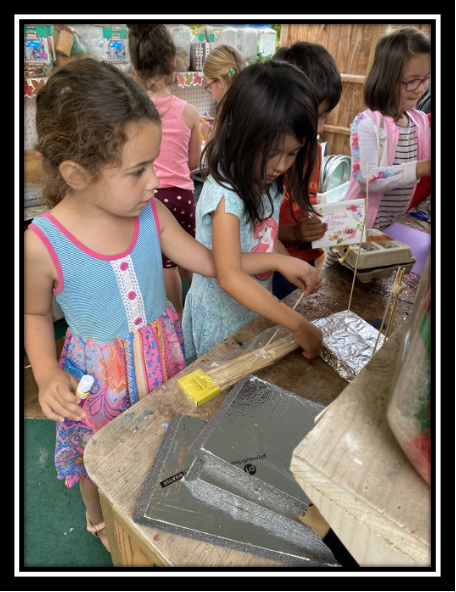 children making boats at preschool