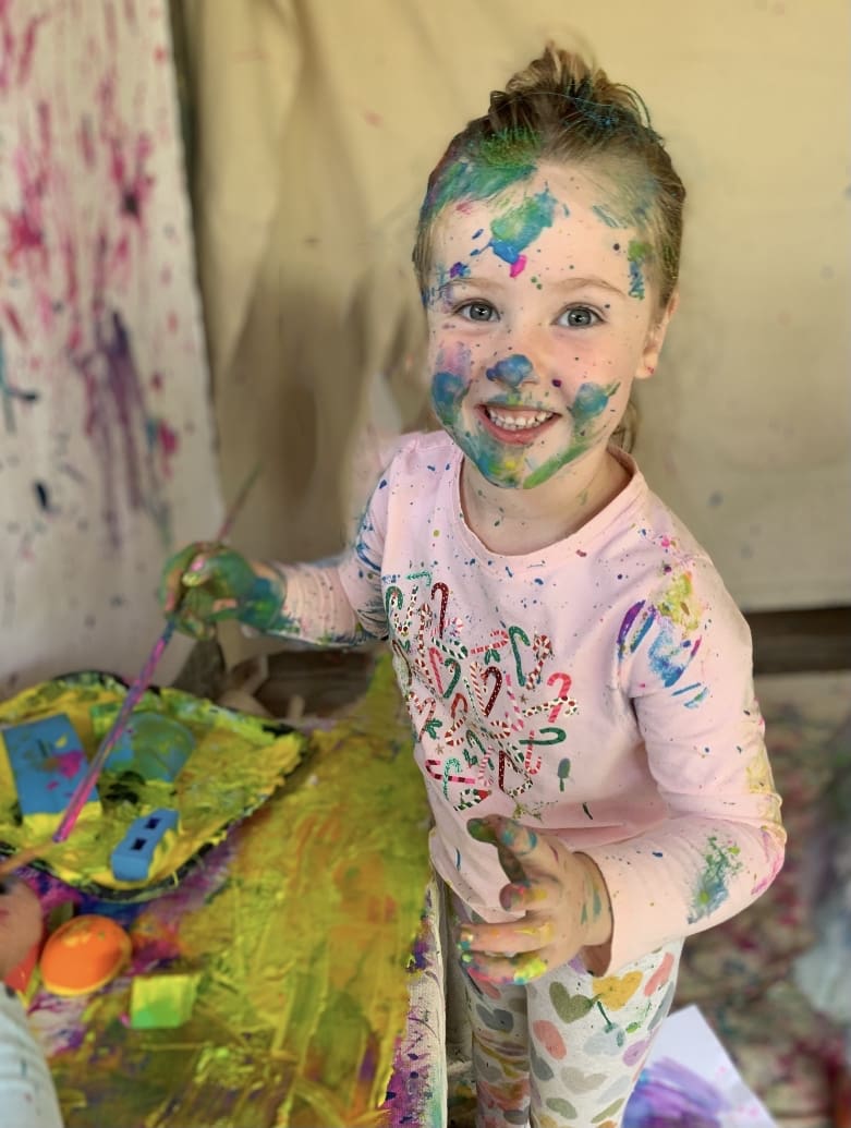 girl with messy art project girl with messy art project