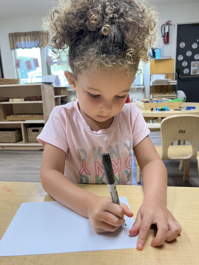 child drawing at preschool
