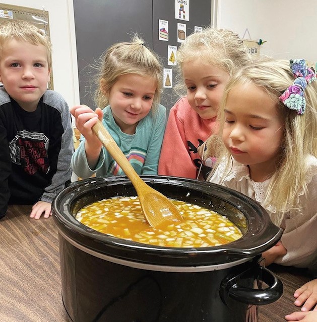 children making matza ball soup