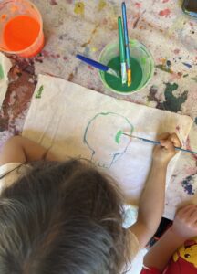 painting linen at preschool