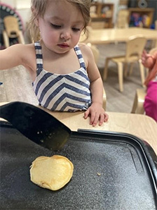 cooking pancakes at preschool
