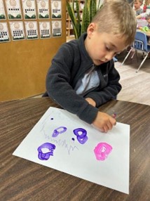 painting with music at preschool