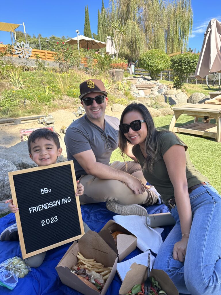 family smiling at carmel mountain preschool