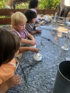 young child preparing food