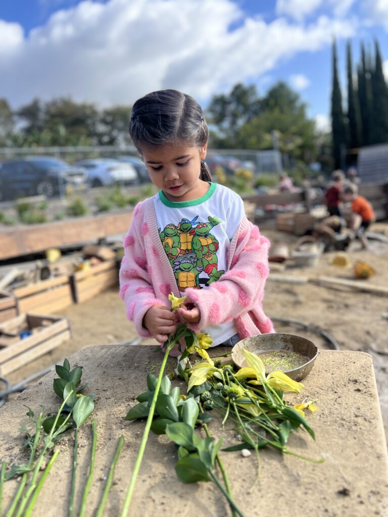 girl with flowers outside